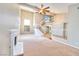 Spacious living room with a fireplace and high ceilings at 1411 Bareback Ct, Henderson, NV 89014