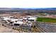 Aerial view of the school complex, including sports fields, parking, and main buildings at 1411 Bareback Ct, Henderson, NV 89014