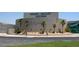 Green Valley High School exterior view with palm trees and front parking lot at 1411 Bareback Ct, Henderson, NV 89014