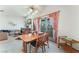 Dining area with wooden table and chairs and access to patio at 1751 E Reno Ave # 206, Las Vegas, NV 89119