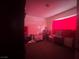 Small bedroom with window, crib, and dresser at 1900 W Carey Ave, North Las Vegas, NV 89032