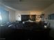 Main bedroom with a large bed and nightstands at 1900 W Carey Ave, North Las Vegas, NV 89032