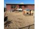 Front yard with play equipment and bicycles at 1900 W Carey Ave, North Las Vegas, NV 89032