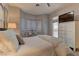 Bright bedroom with king-size bed and patio access at 2020 Hallston St, Las Vegas, NV 89134