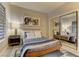 Bright bedroom featuring a mirrored closet and a comfy bed at 2020 Hallston St, Las Vegas, NV 89134