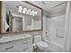 Bathroom boasts a large mirror, bathtub, and updated vanity at 220 E Flamingo Rd # 426, Las Vegas, NV 89169