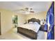 Large bedroom with king-size bed and en-suite bathroom at 2256 Sabroso St, Las Vegas, NV 89156