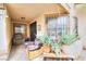 Inviting front patio with seating and potted plants at 2256 Sabroso St, Las Vegas, NV 89156