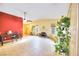 Bright living room with fireplace and tile floors at 2256 Sabroso St, Las Vegas, NV 89156