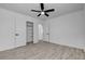 Bedroom with wood-look floors and closet with shelving at 240 S 16Th St, Las Vegas, NV 89101