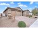 House exterior featuring a brick paver driveway at 2432 Mesa Wind Ave, North Las Vegas, NV 89030