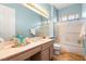 Clean bathroom with single vanity and shower/tub combo at 2563 Collinsville Dr, Henderson, NV 89052