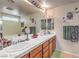 Double vanity bathroom with a large mirror and plenty of counter space at 2671 Colina Bella Ct, Las Vegas, NV 89142