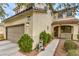 Inviting two-story home with a landscaped front yard and two-car garage at 2671 Colina Bella Ct, Las Vegas, NV 89142