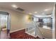 Upstairs hallway with hardwood floors and a view of a bathroom at 2671 Colina Bella Ct, Las Vegas, NV 89142