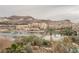 Aerial view of lakefront community with upscale buildings and resort-style amenities at 29 Montelago Blvd # 337, Henderson, NV 89011