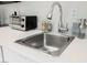 Modern kitchen sink and countertop with sleek design at 29 Montelago Blvd # 337, Henderson, NV 89011
