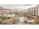 Community pool with lake and resort views at 29 Montelago Blvd # 337, Henderson, NV 89011