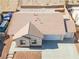 Single-story house with attached garage and driveway, seen from above at 2915 Rippling Springs St, Laughlin, NV 89029