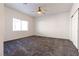 Spacious bedroom with ceiling fan and large closet at 2915 Rippling Springs St, Laughlin, NV 89029