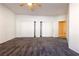 Spacious bedroom with large closets and ceiling fan at 2915 Rippling Springs St, Laughlin, NV 89029