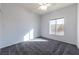 Bright bedroom with white walls, carpet, and a window with natural light at 2915 Rippling Springs St, Laughlin, NV 89029