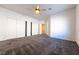 Large bedroom with multiple closets and ceiling fan at 2915 Rippling Springs St, Laughlin, NV 89029