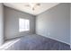 Spacious bedroom with grey walls and carpet at 2915 Rippling Springs St, Laughlin, NV 89029