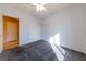 Bedroom with white walls, grey carpet, and a large closet at 2915 Rippling Springs St, Laughlin, NV 89029