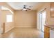Light and airy dining area with tile flooring and access to patio at 2915 Rippling Springs St, Laughlin, NV 89029