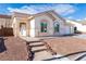 Charming house with a stone walkway and two-car garage at 2915 Rippling Springs St, Laughlin, NV 89029