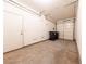 Garage with concrete floor and ample space for two vehicles at 2915 Rippling Springs St, Laughlin, NV 89029