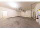 Spacious two-car garage with concrete flooring and extra storage at 2915 Rippling Springs St, Laughlin, NV 89029