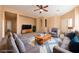 Spacious living room featuring comfortable seating and a large TV at 2915 Rippling Springs St, Laughlin, NV 89029