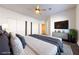 Large main bedroom with ample closet space and TV at 2915 Rippling Springs St, Laughlin, NV 89029