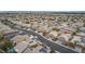 Aerial view of a house in a residential neighborhood with surrounding homes at 3029 Bublin Bay Ave, North Las Vegas, NV 89081