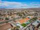 Scenic aerial image highlights a neighborhood setting with a beautiful pool and mountain views at 321 E Middleton Dr, Henderson, NV 89015