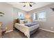 Inviting bedroom offering a cozy space with neutral tones, ceiling fan and comfortable furnishings at 321 E Middleton Dr, Henderson, NV 89015