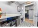 Functional laundry room features a utility sink with extra counter space and plenty of storage options at 321 E Middleton Dr, Henderson, NV 89015