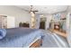 Spacious primary bedroom featuring neutral colors and a tile fireplace at 321 E Middleton Dr, Henderson, NV 89015
