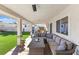 Covered patio featuring an outdoor seating area and ceiling fan at 321 E Middleton Dr, Henderson, NV 89015