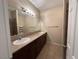 Bathroom featuring double sinks and a large mirror at 3550 Bay Sands Dr # 3081, Laughlin, NV 89029