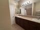Bathroom with double sinks, tile flooring, and lots of storage at 3550 Bay Sands Dr # 3081, Laughlin, NV 89029
