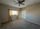 Bedroom with carpet flooring, ceiling fan, curtains and windows at 3550 Bay Sands Dr # 3081, Laughlin, NV 89029