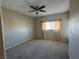 Bedroom with carpet flooring, ceiling fan and window overlooking the exterior at 3550 Bay Sands Dr # 3081, Laughlin, NV 89029