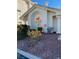 Property entrance with colorful palm tree decorations and manicured landscaping at 3550 Bay Sands Dr # 3081, Laughlin, NV 89029