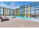 Luxury rooftop pool with city views and lounge chairs at 3722 S Las Vegas Blvd # 2310, Las Vegas, NV 89158