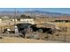 Horse corral features a covered shelter, multiple horses, and a mountain view at 3821 S Tumbleweed Ave, Pahrump, NV 89048