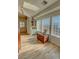 Inviting living room featuring wood flooring, large windows with lots of natural light, and stylish decor at 3821 S Tumbleweed Ave, Pahrump, NV 89048