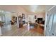 Spacious living room with hardwood floors, fireplace, and ample natural light at 3821 S Tumbleweed Ave, Pahrump, NV 89048